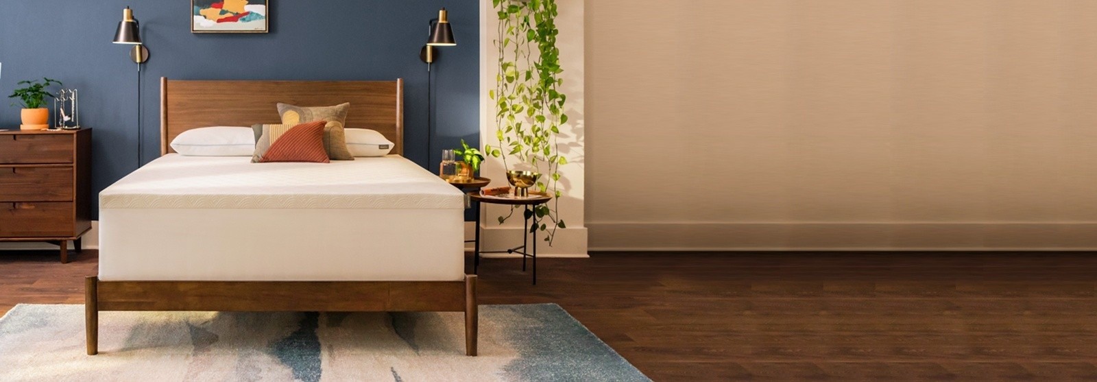 A Cloud topper on a bed in a styled room