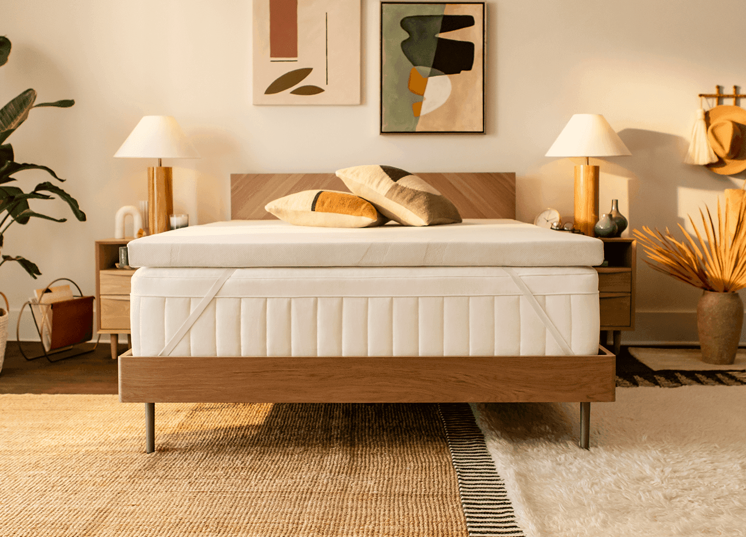 A TEMPUR-Adapt® Topper on a mattress in a styled room